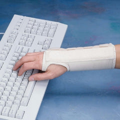 Patterson Medical Supply Wrist Brace Rolyan® Rolyan® D-Ring™ Firm Aluminum / Cotton Left Hand White Small