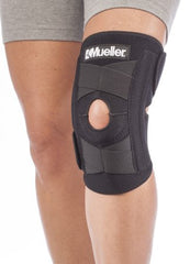 Mueller Sports Medicine Knee Stabilizer Mueller® Self-Adjusting™ Knee Stabilizer One Size Fits Most Hook and Loop Strap Closure 14 to 20 Inch Above the Knee Circumference Left or Right Knee