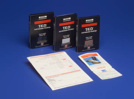 Cardinal Anti-embolism Stocking T.E.D.™ Thigh High Medium / Long White Closed Toe